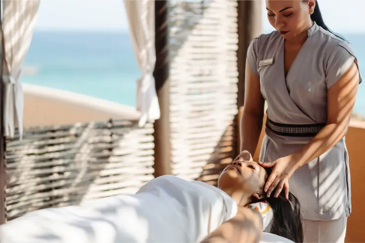 A relaxing spa massage therapy session by the ocean.